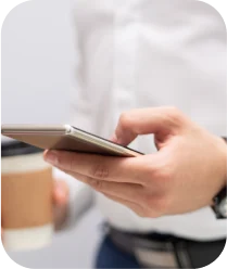 A hand holding a phone